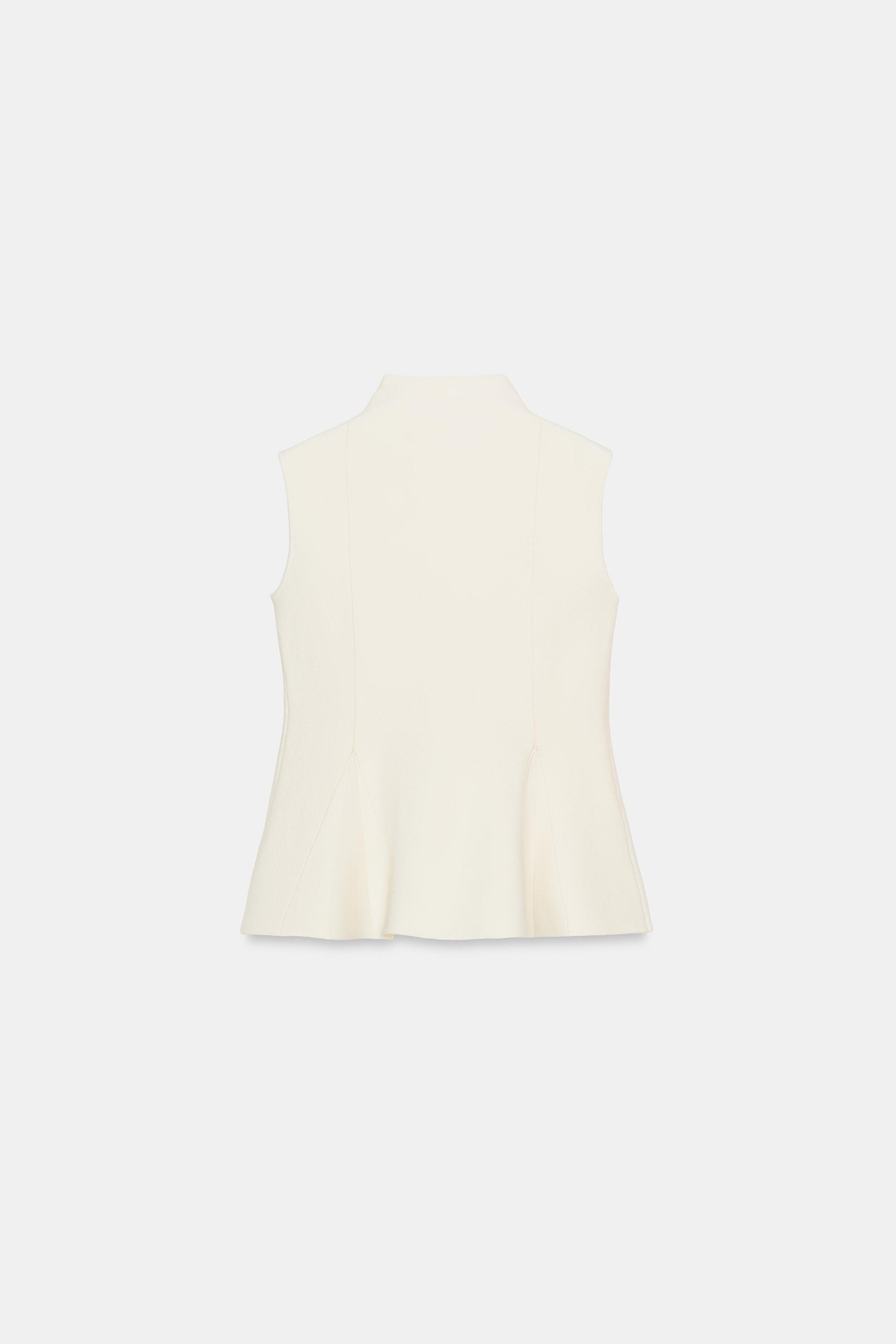 TOP EN MAILLE PÉPLUM